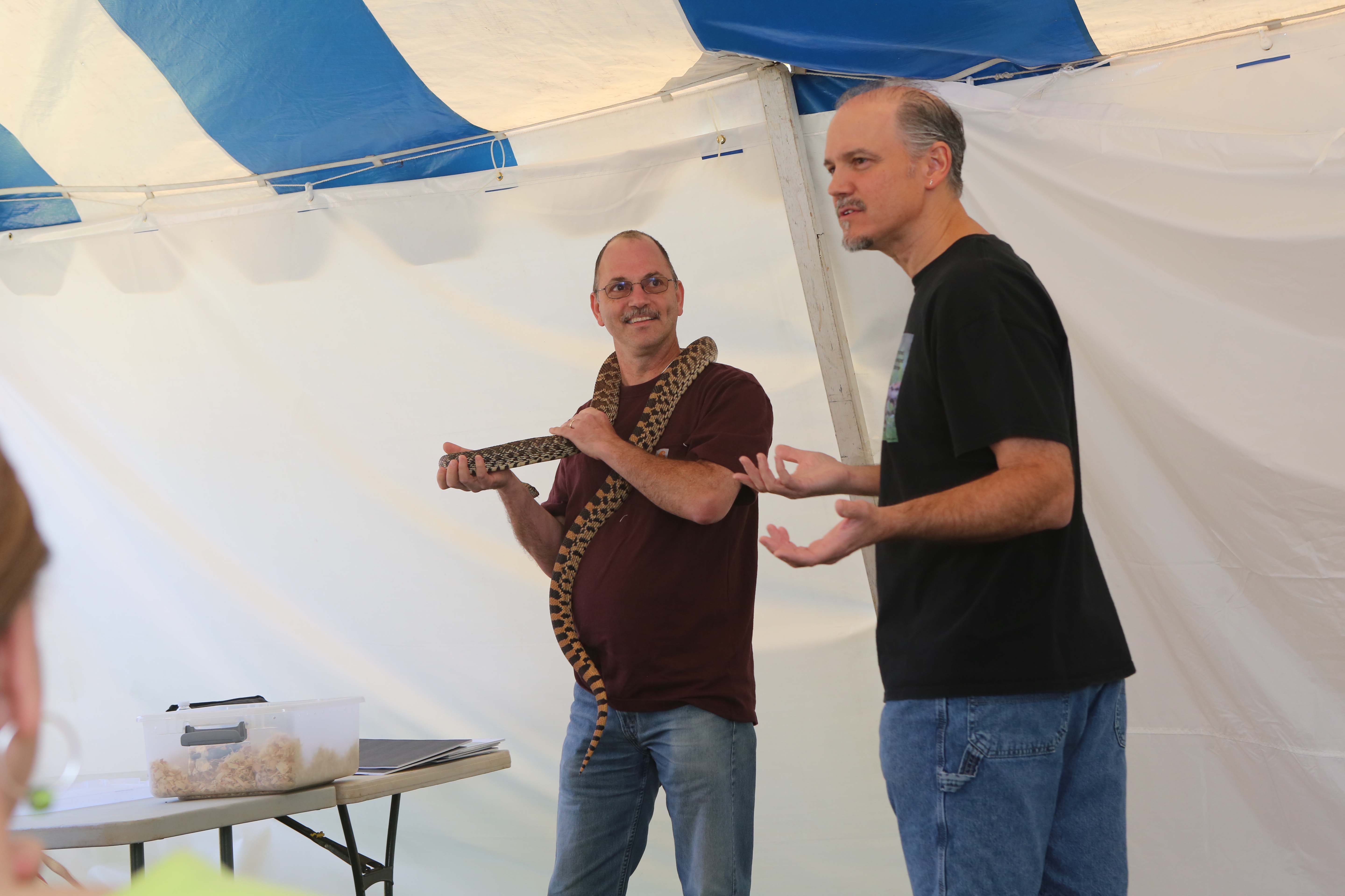 Participant holding snake